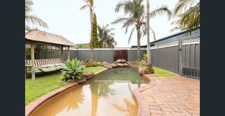 Stylish Family Home with Pool, Bar & Balcony in Prime Werribee Location! - Photo 3