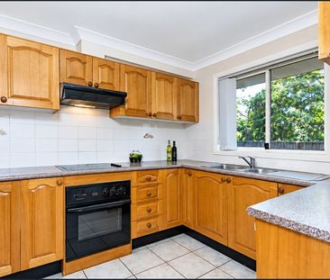 Spacious Family Home with Private Backyard & Double Garage - Photo 3