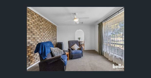 Spacious 4-Bed, 2-Bath Family Home in Wanted Locale - Photo 1