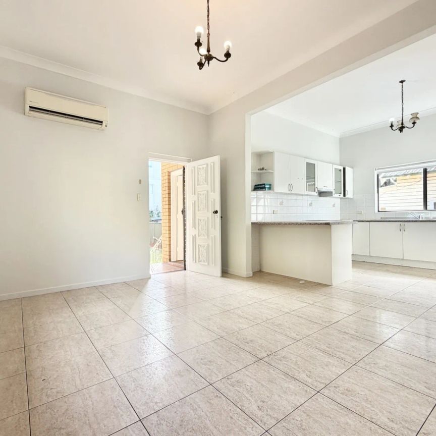 Freshly painted four bedroom family home in convenient location - Photo 1