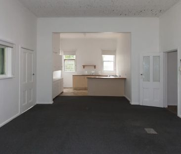 Spacious Four-Bedroom Home in Prime Location - Photo 5