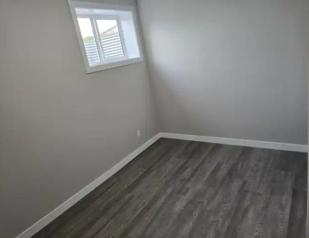 Brand New Two bedrooms and one bath Legal Basement Suite with a Private side ent | Calgary - Photo 1