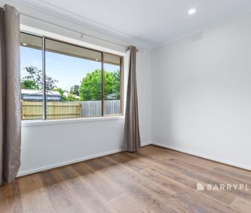 What a Living Opportunity! Prime Location & Freshly Updated Appeal - Photo 3