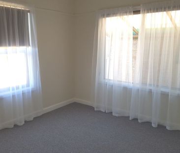 A neat two bedder. - Photo 2