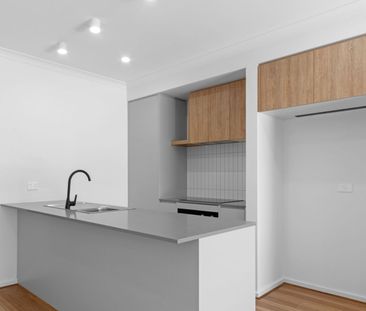 Stylish Two-Level Townhouse with Modern Comfort & Flexibility - Photo 4