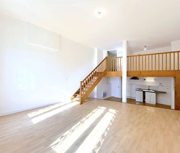 A LOUER APPARTEMENT 2 PIÈCES AVEC MEZZANINE- CAVIGNAC CENTRE - Photo 3