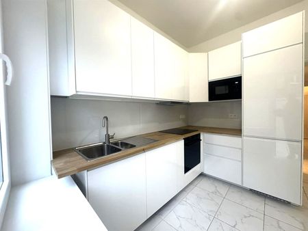 Volledig gerenoveerd appartement op gelijkvloers met aangenaam terras/koer. - Photo 5