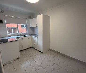 Modern & Convenient 2-Bedroom Unit – Updated & Ready to Move In! - Photo 2