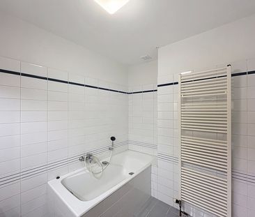 Ruim duplex-appartement met 3 slaapkamers in centrum Dilbeek - Foto 2