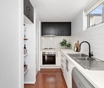 Two Floors, Two Carports, Too Good to Miss! - Photo 5