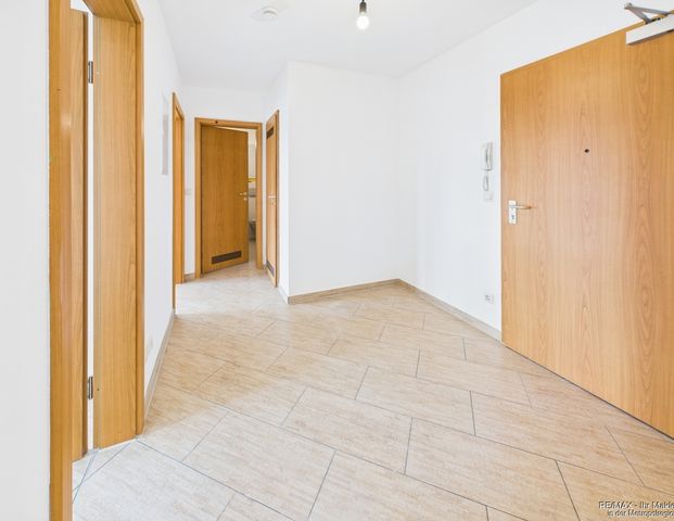 Moderne Wohnung mit neuer EBK und schönem Balkonblick - Foto 1