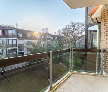 Charmante 2-Zimmerwohnung mit Tiefgaragenstellplatz in begehrter Lage! - Foto 1