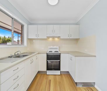 Step into comfort and style with this beautifully refreshed home! - Photo 2