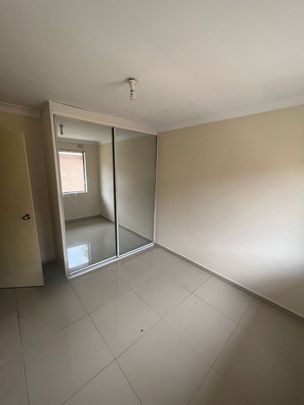 Luxury Living in Merrylands: Rent a Stunning Apartment at 4/22 Military Road - Photo 1