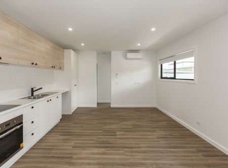 Enjoy the luxury of a freshly built 2 bedroom unit. - Photo 2