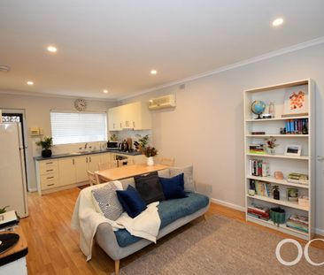 Open the Door To Coastal Convenience with a Private Courtyard Retreat - Photo 1