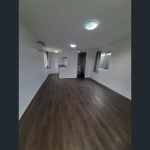 STREET FRONTAGE, PRVIATE ENTRY & CARPORT! - Photo 2