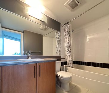 Bright 2 Bed High Rise Condo With False Creek Views - Photo 1