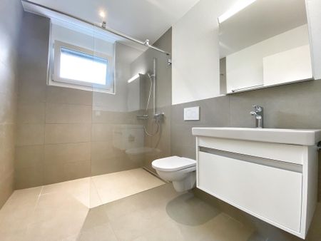 Moderne 3.5-Zimmer-Wohnung 75.3m² mit grosszügiger Loggia - Photo 2