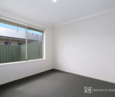 COMFORTABLE TWO-BEDROOM HOME WITH SECURE PRIVATE YARD - Photo 2