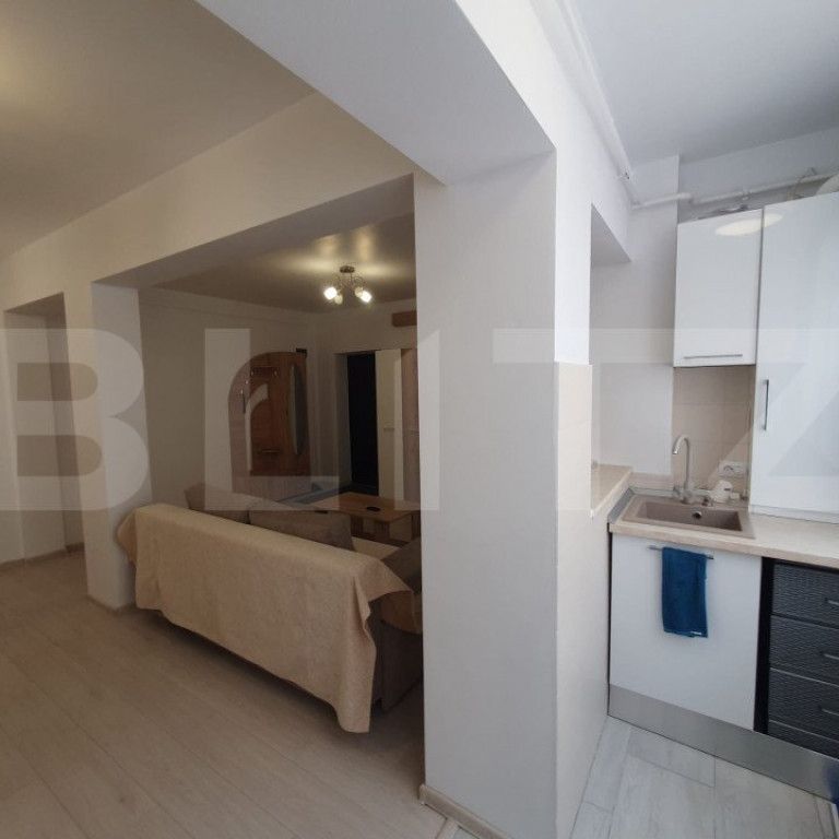 Apartament modern cu 2 camere, parcare privată, cartierul 1 - Fotografie 1