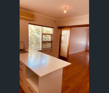 Spacious Three-Bedroom Family Home with Large Backyard - Photo 4