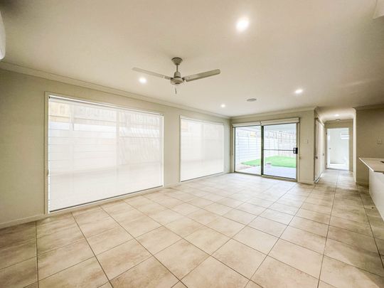 Spacious & Modern Family Home in Popular Location - Photo 1