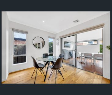 Spacious 4-Bedroom Home with Multiple Living Zones - Photo 4