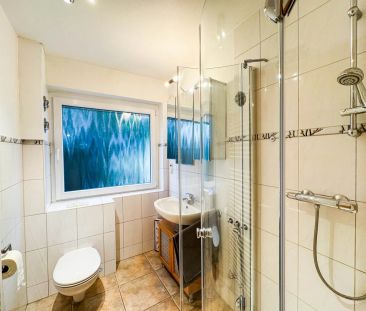 Erdgeschosswohnung in ruhigem Zweifamilienhaus mit überdachter Terr... - Foto 6