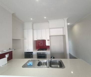 Stylish Park-Facing Townhouse Offering Comfort & Convenience! - Photo 6