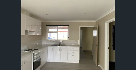 Updated unit, close to town! - Photo 4