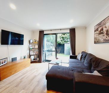 Stylish 2-Bedroom Home with Modern Comforts & Private Outdoor Spaces - Photo 1