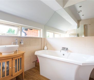 A substantial and attractive four bedroom thatched cottage with a one/two bedroom annexe, outbuildings and extensive gardens. - Photo 4