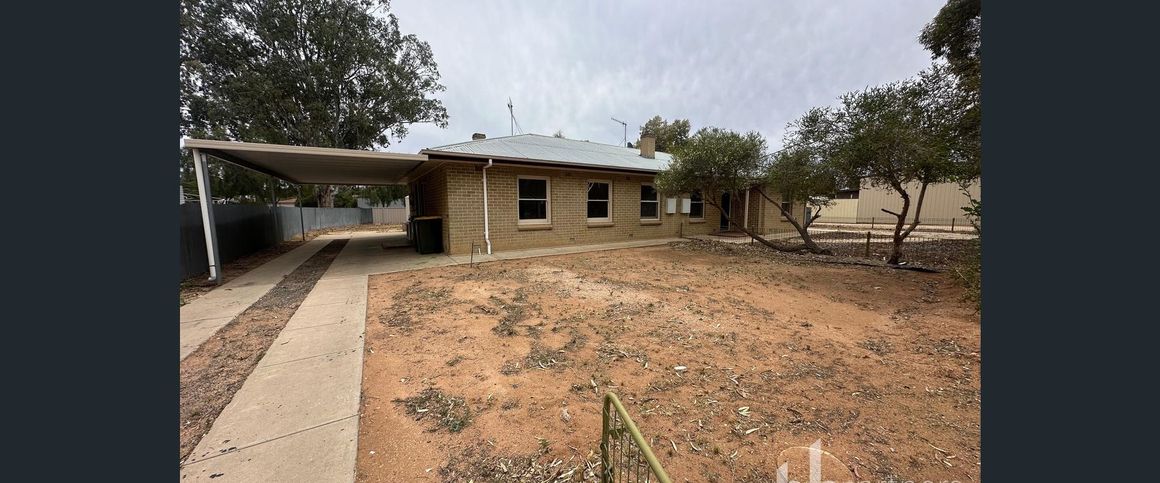 Three-Bedroom Home Located on Quiet Street - Photo 1