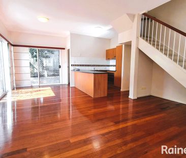 Good Size Townhouse in Great Taringa location - Photo 1