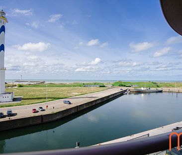 Dit prachtige appartement op het 4de verdiep van residentie “One Baelskaai” in Oosteroever, Oostende, heeft veel te bieden voor wie op zoek is naar een leuke plek om te wonen. - Foto 1