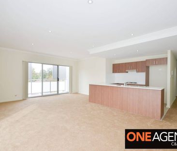 Spacious & Stylish Living with a Generous Balcony! - Photo 1