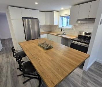 ​Superbe appartement 3 ½ entièrement rénové moderne dans un Triplex... - Photo 2
