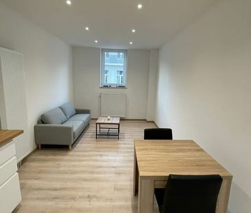 Appartement te huur - foto 1