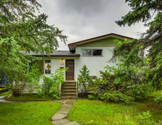 Fairview Rental – Main & Top Floors only 4 minutes walk to c-train! | 48 Fielding Drive Southeast, Calgary - Photo 1