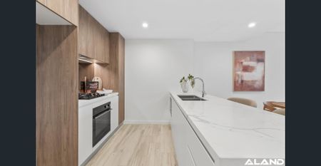 Top-Floor Two Bedroom | Rare Layout with Seamless Indoor-Outdoor Living - Photo 2