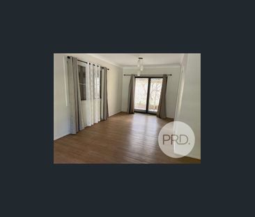 LOW SET THREE BEDROOM BRICK HOME - Photo 3