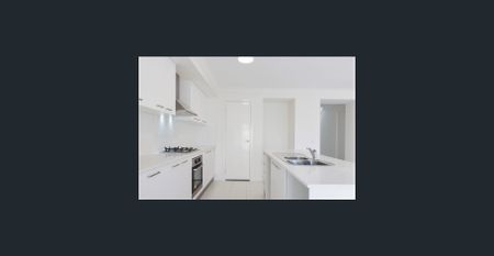 Stylish Four-Bedroom Home in Prime Marsden Park Location - Photo 4