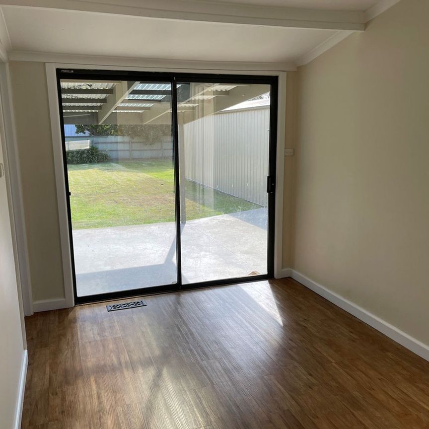 COMFORTABLE 3 BEDROOM HOME - Photo 1