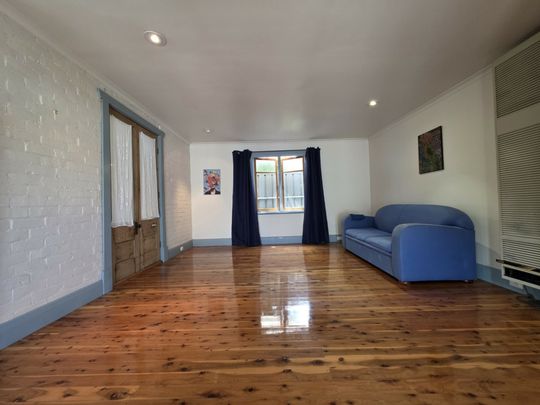 Character-Filled Coastal Cottage - Photo 1