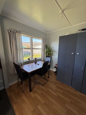 Sunny Family Home with Large Fully Fenced Section - Photo 1