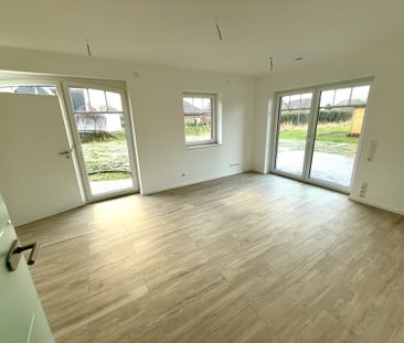 Neubauwohnung im Erdgeschoss mit großer Garage und Garten - Foto 2