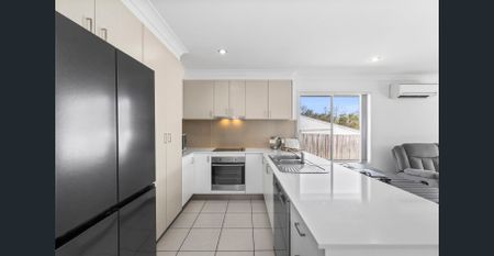 Modern, Low-Maintenance Living in a Prime Coomera Location - Photo 4