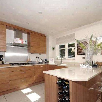 A modern first floor apartment in a gated development. - Photo 1