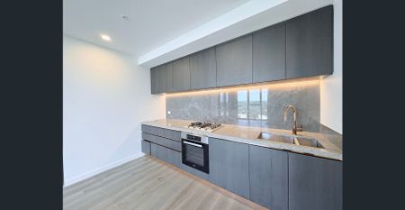 Modern Luxury Living in TRIO | Near-New 2B 2B 1CP Apartment - Photo 5